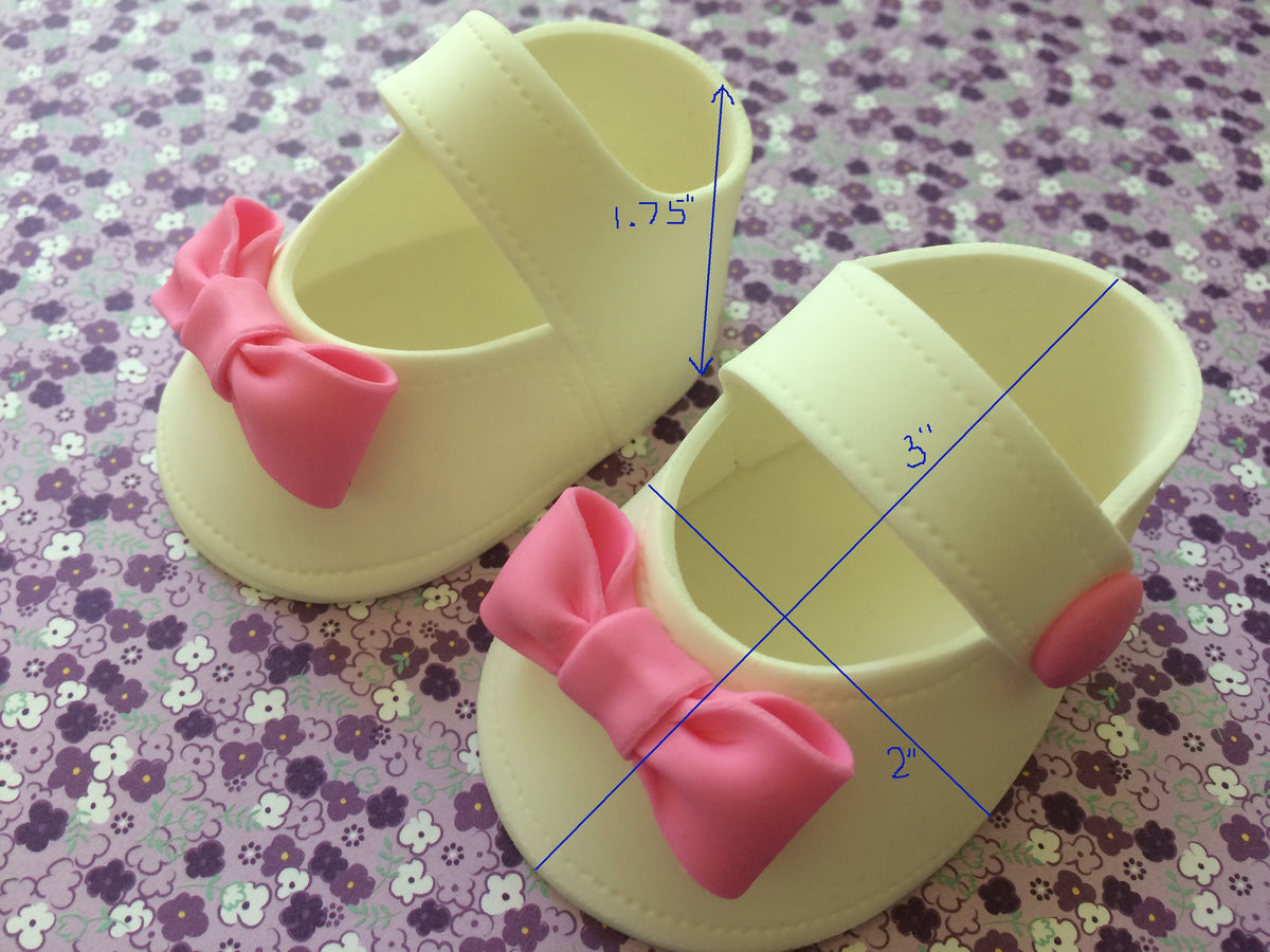 Baby shower cake toppper/ Pink baby girl shoes with small flowers gum paste fondant
