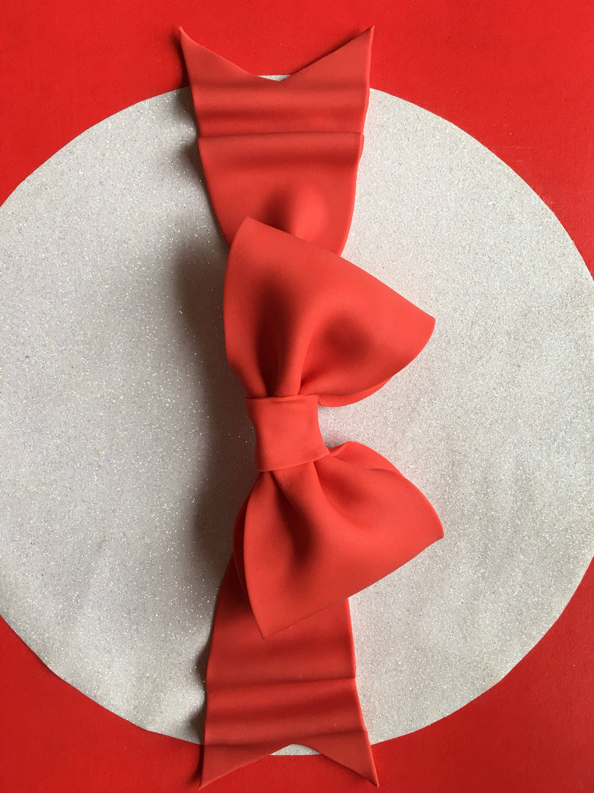 Red bow gum paste fondant for birthday cake
