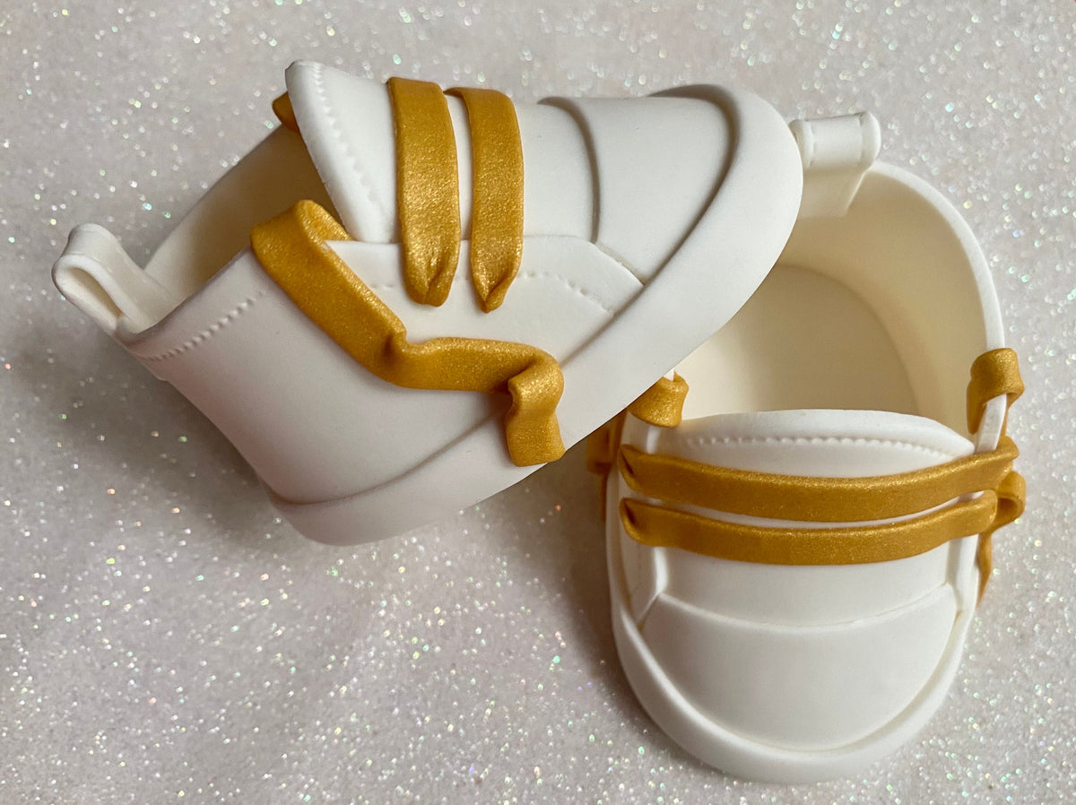 White fondant shoes with gold laces