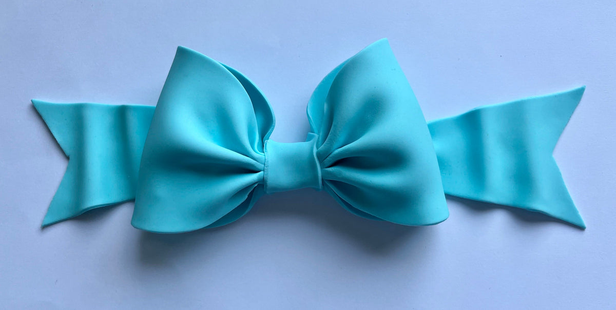 Baby blue/ pastel blue bow gum paste fondant for birthday cake