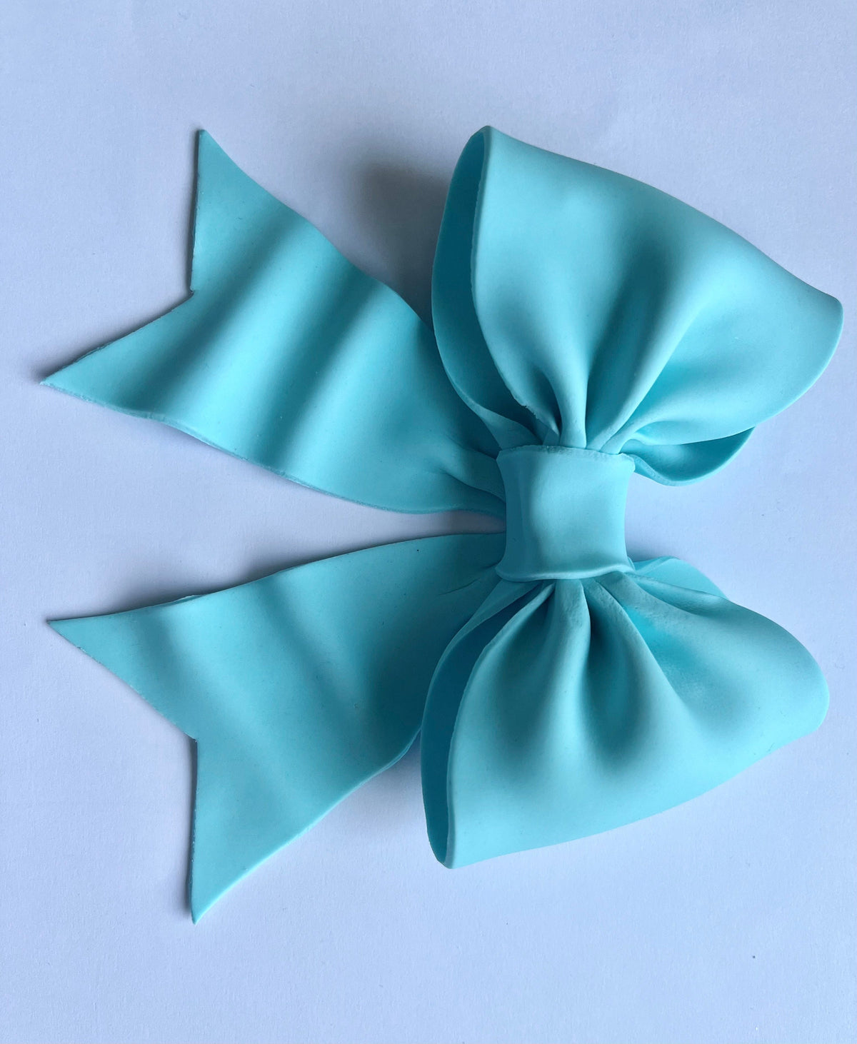 Baby blue/ pastel blue bow gum paste fondant for birthday cake