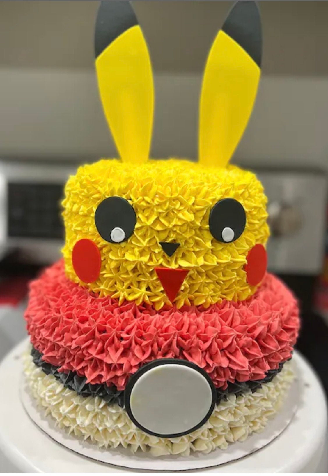 Fondant Pikachu cake topper.