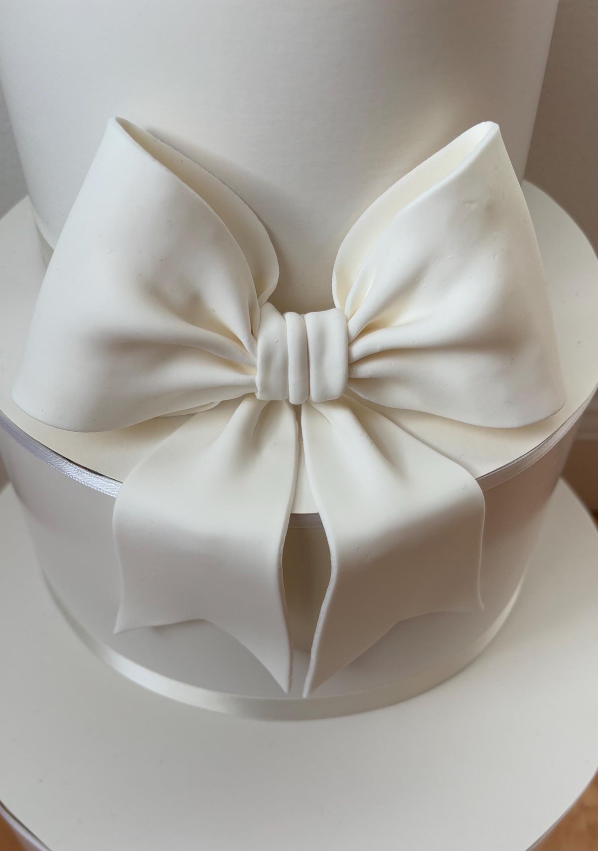 Big white fondant bow