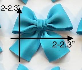 Set of 12 blue bows cupcake toppers.