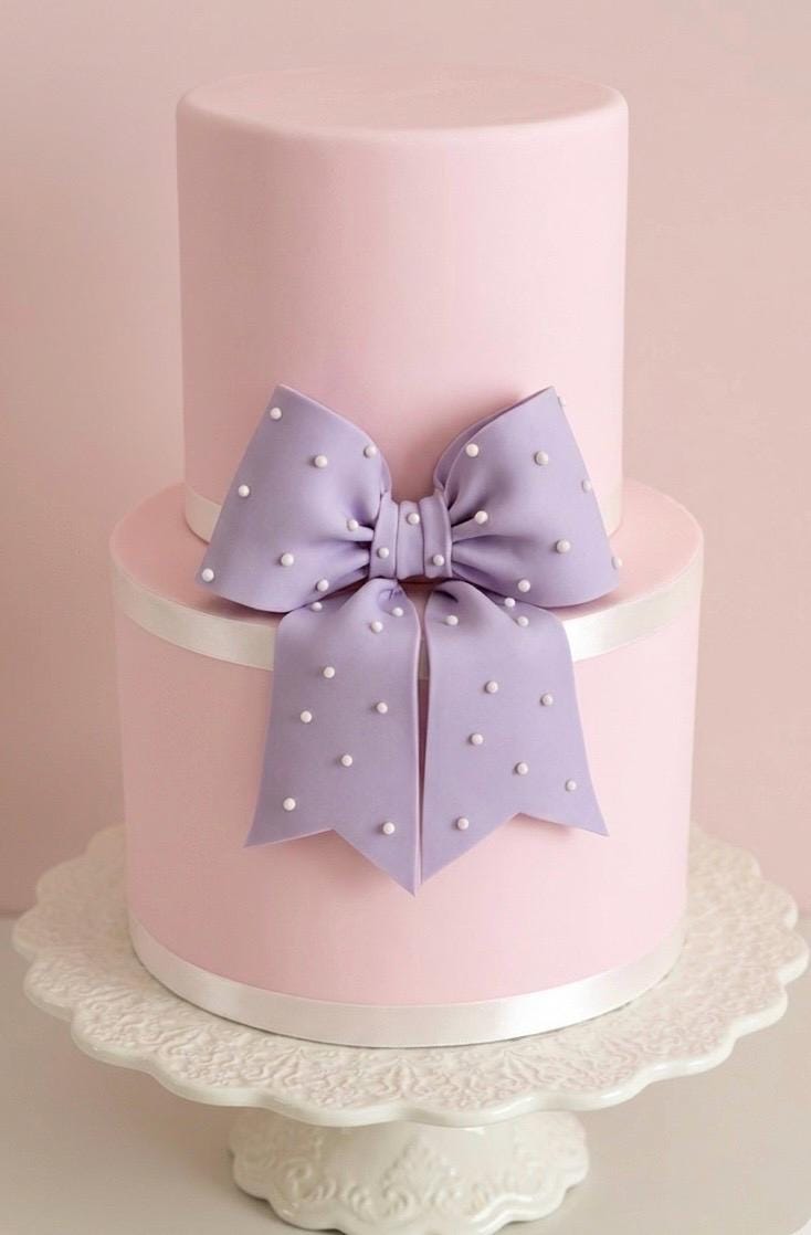 Big lavender fondant bow with pearl dots