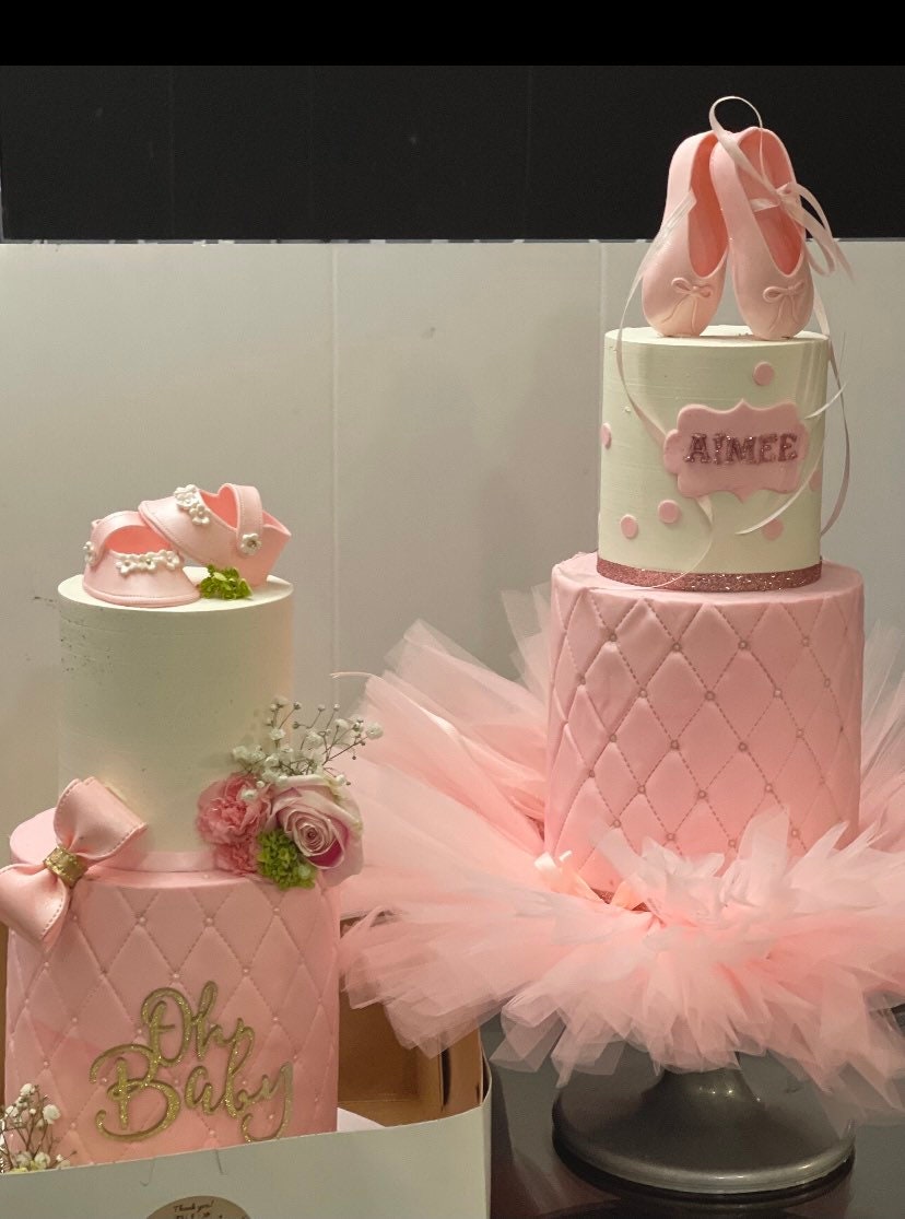 Baby shower cake toppper/ Pink baby girl shoes with small flowers gum paste fondant