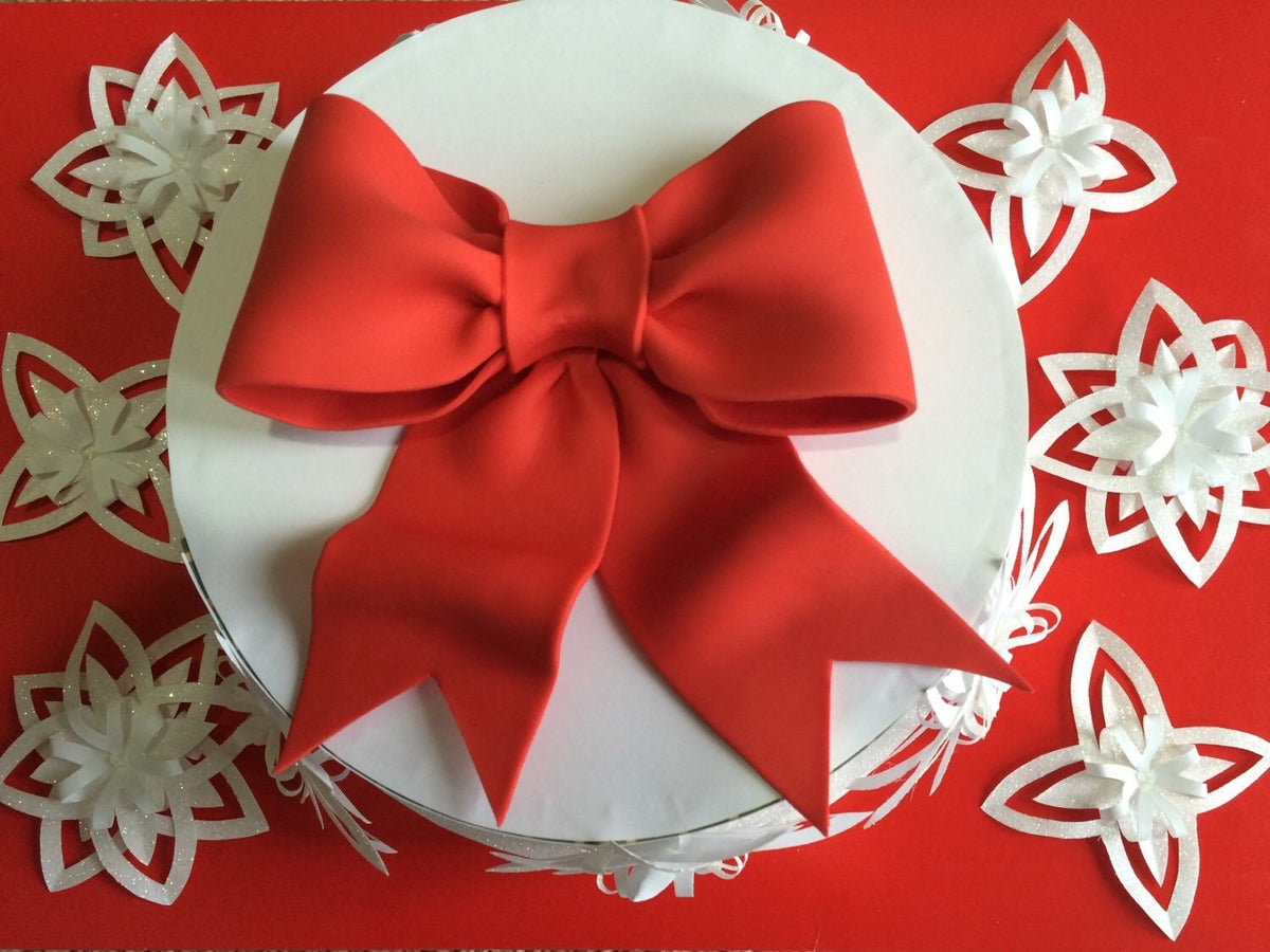 Red bow gum paste fondant for birthday cake