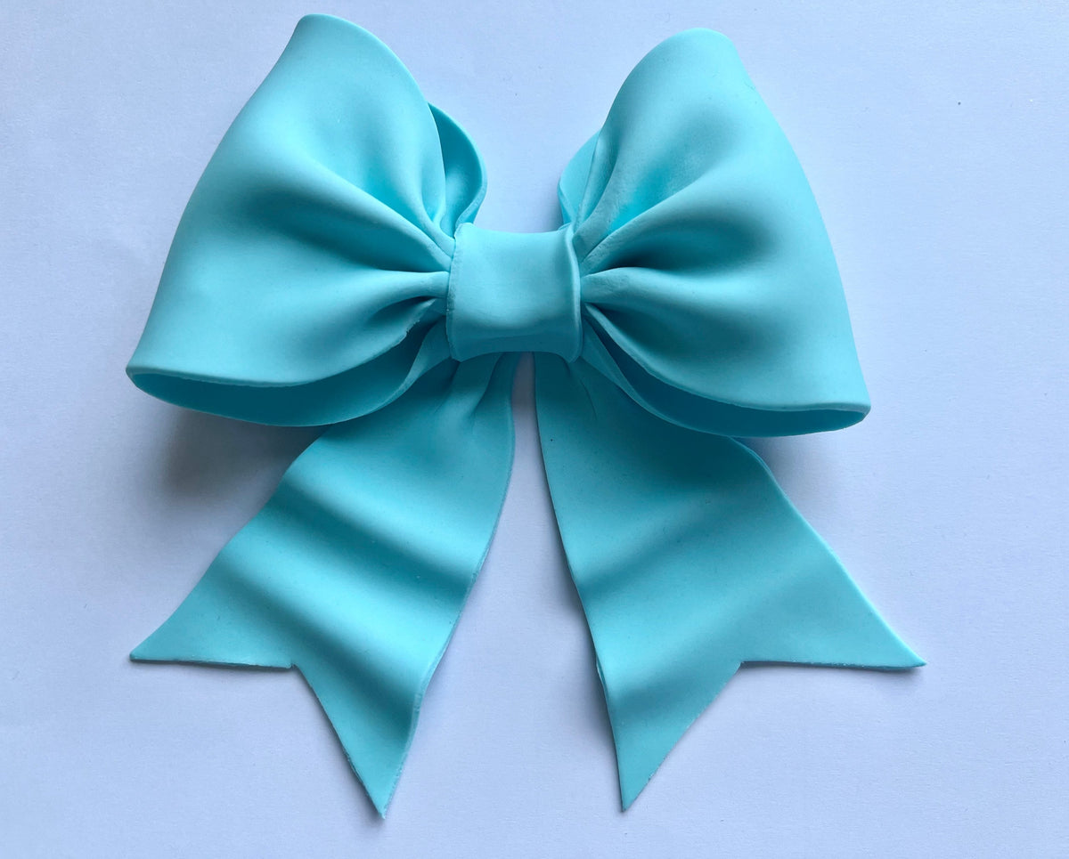 Baby blue/ pastel blue bow gum paste fondant for birthday cake