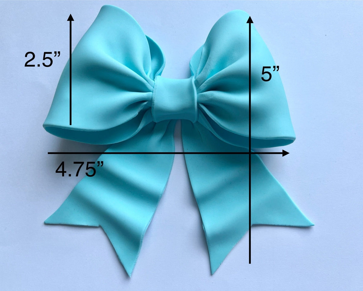 Baby blue/ pastel blue bow gum paste fondant for birthday cake