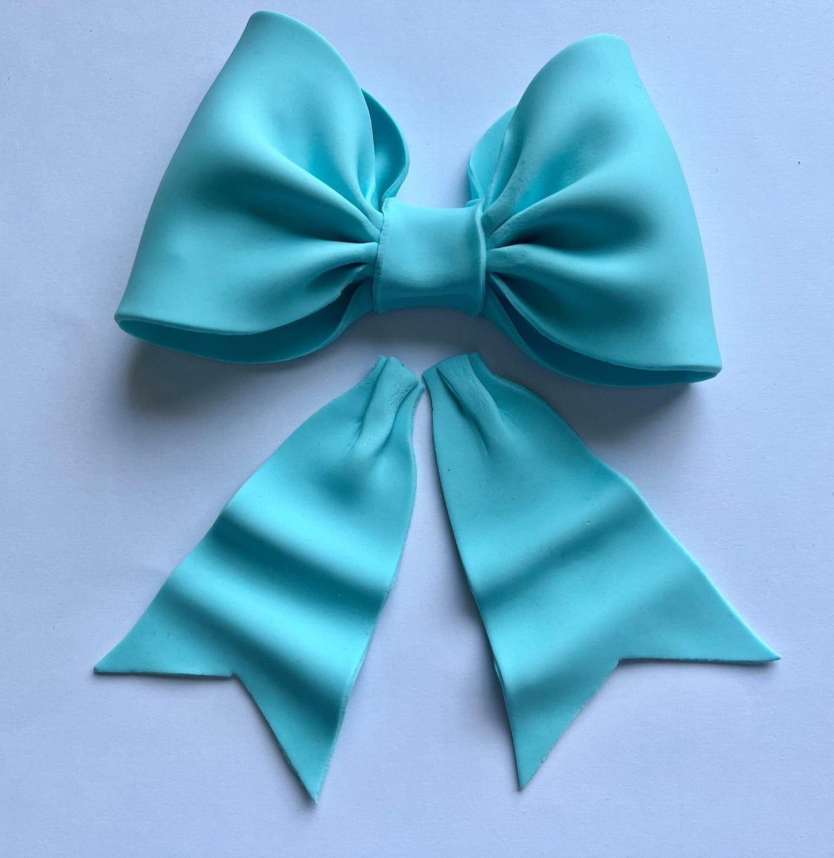 Baby blue/ pastel blue bow gum paste fondant for birthday cake