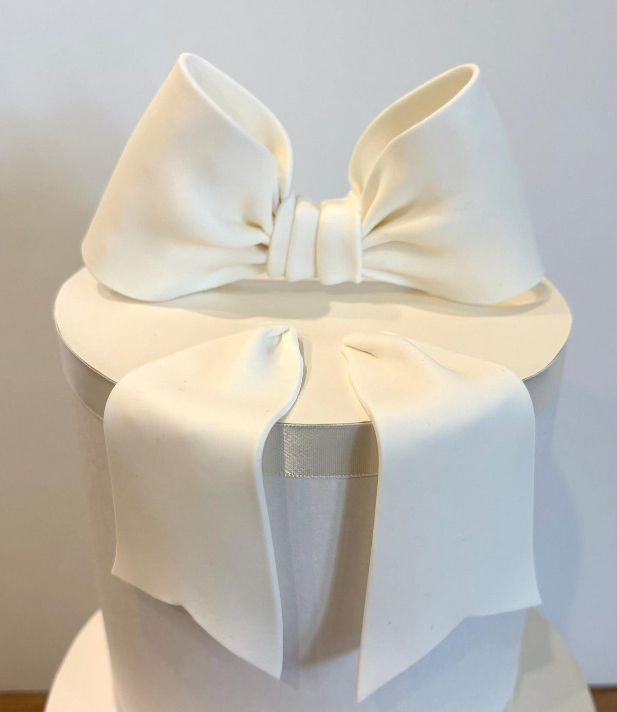 Big white fondant bow