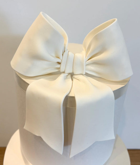 Big white fondant bow