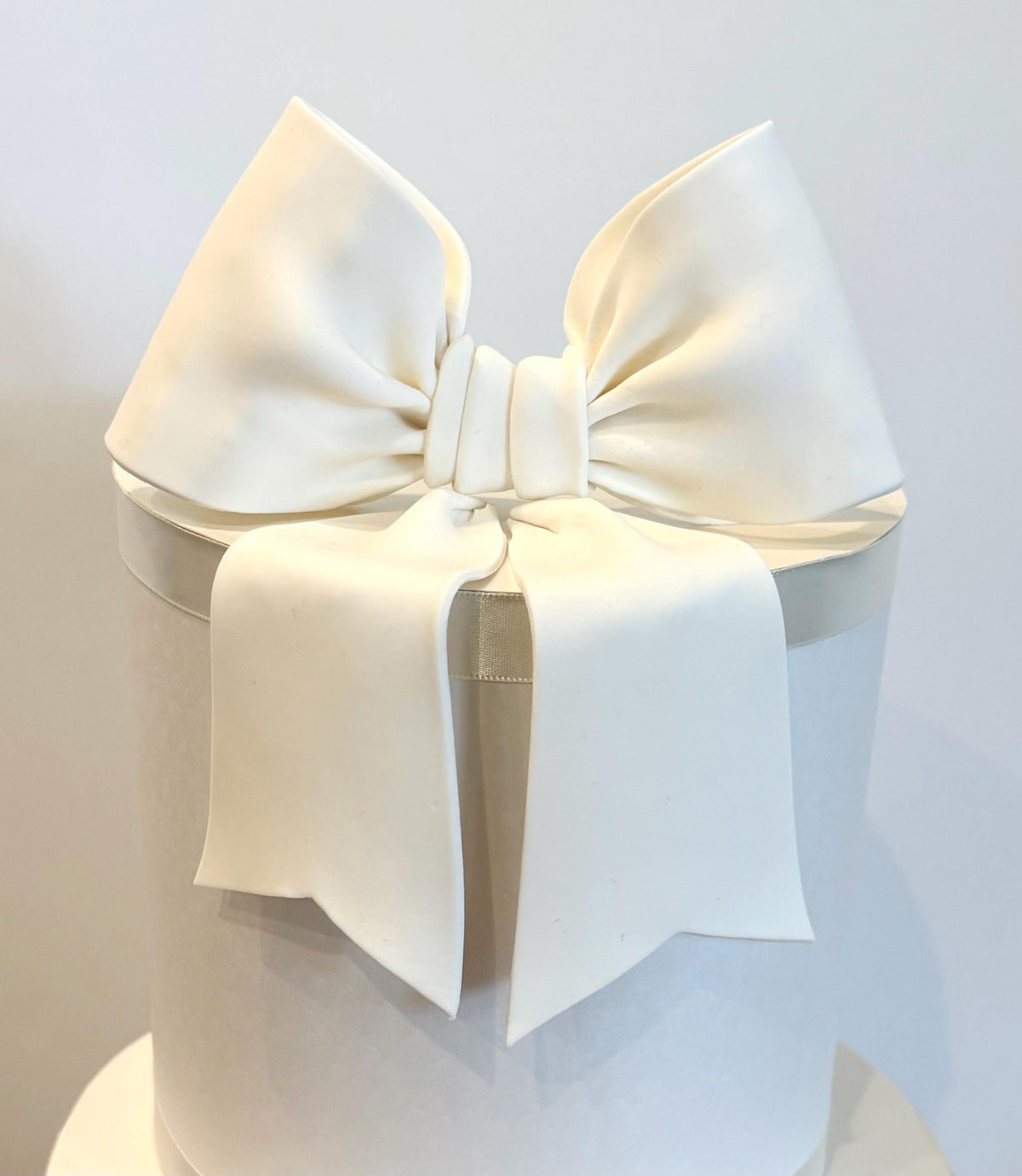 Big white fondant bow