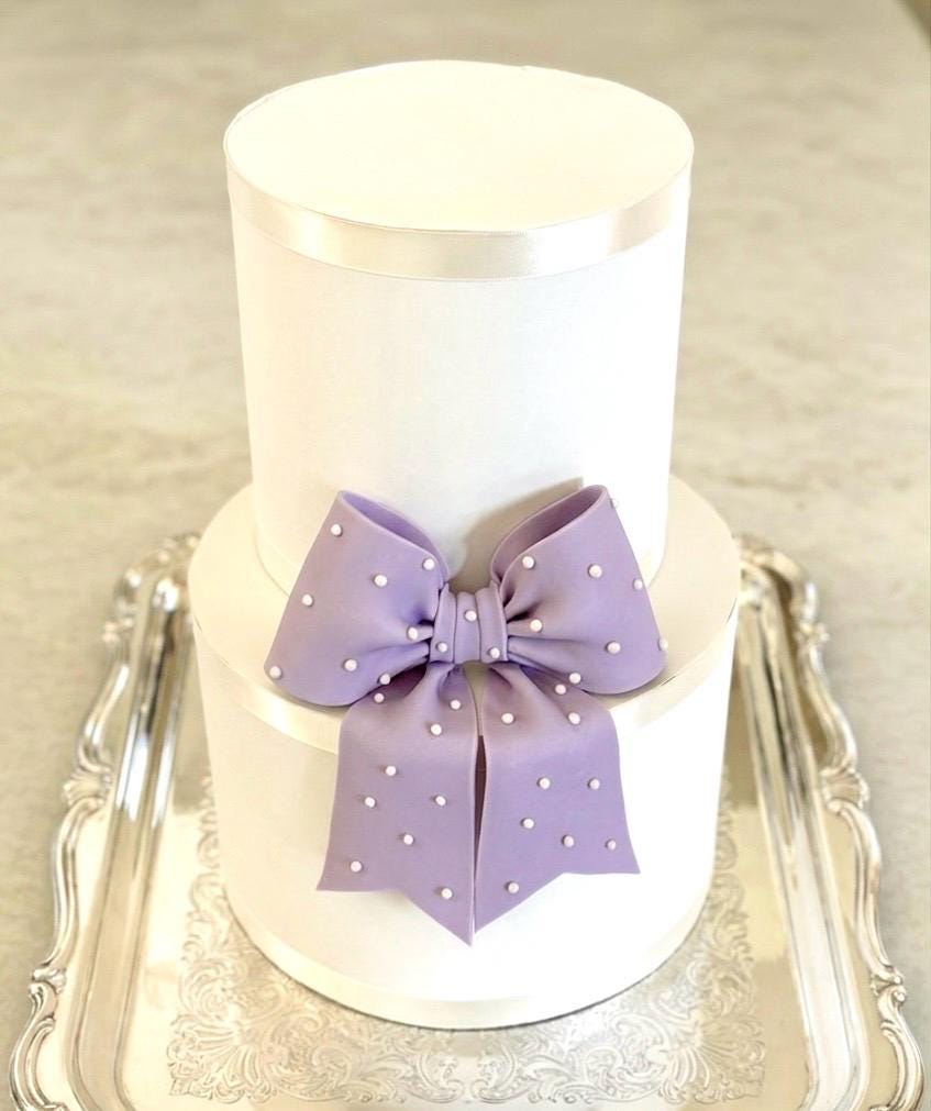 Big lavender fondant bow with pearl dots